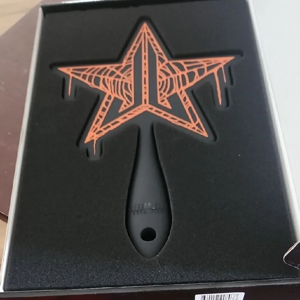 Jeffree Star Black Mirror with Orange Star Design